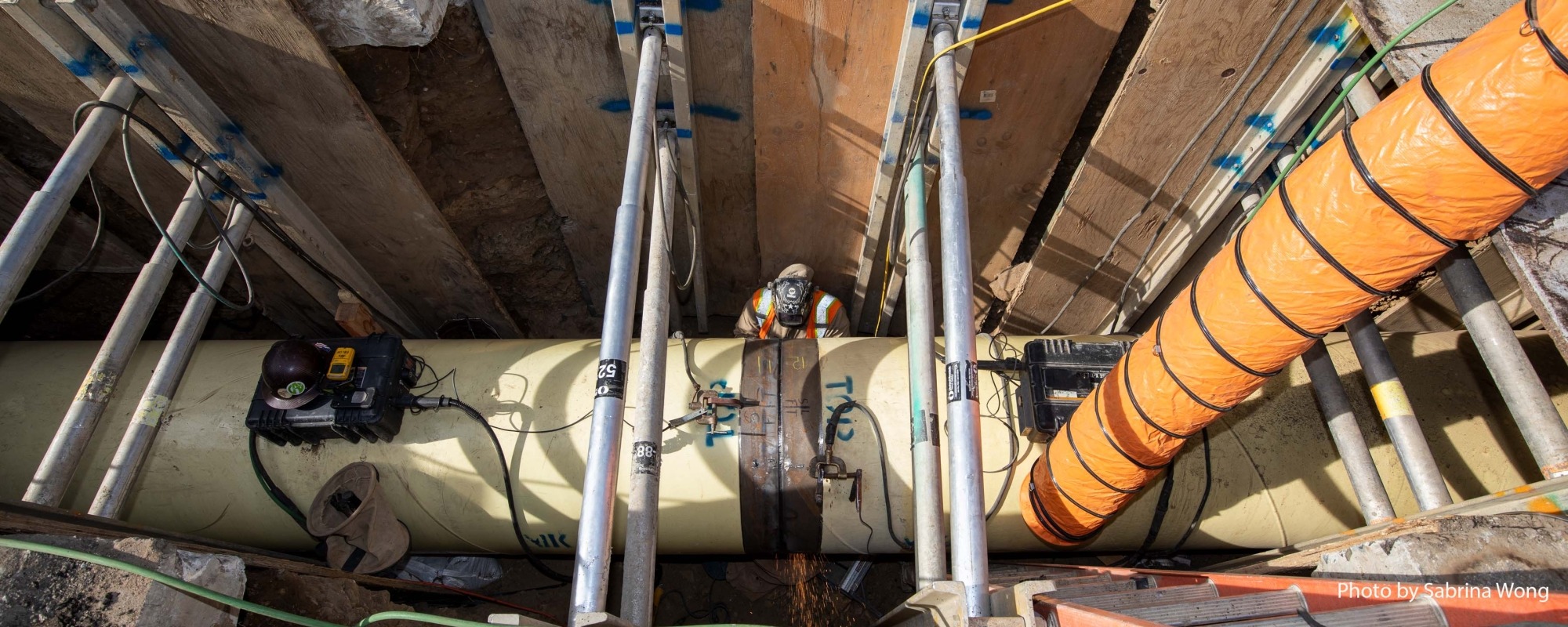 Installing a new welded steel pipe for Potable Emergency Firefighting Water Systems pipeline at 19th Ave. and Sloat Blvd.